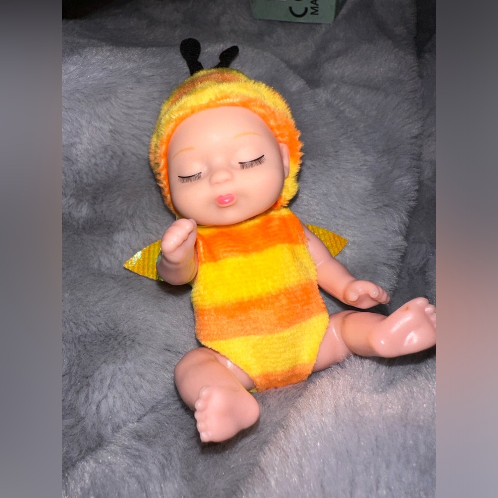 Mini baby doll toy collectible